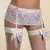 Portaligas de encaje blanco con lazos rosa, ideal para lencería femenina.