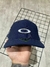 Boné Oakley Tincan Aba Curva Fechado na internet