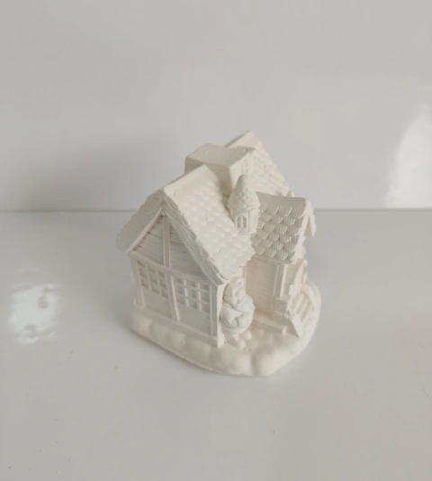 Casita navideña con Papá Noél