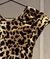 Remera espalda escotada animal print en internet