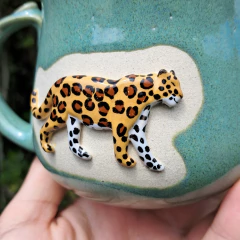 Caneca onça na internet