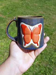 Caneca azul caribe borboleta laranja