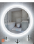 90 cm round LED mirror featuring a halo design, reflecting a modern bathroom with a bathtub and sink.