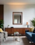 Rectangular LED mirror with luminous oak frame, displayed in a modern living room setting.