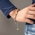Pulseira Mariana/N.Sra. Aparecida 4MM c/ cora e peixe - comprar online