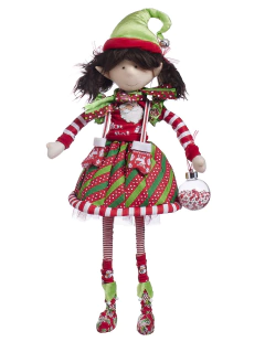 Muñeca duende divertida con falda blanca estampada y gorro verde, sosteniendo una esfera decorativa.