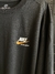 Camiseta Nike Sportwear Logo laranja na internet