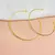 Brinco argola fina G - Banhado a ouro 18k(br0040) - comprar online
