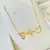 Colar batimentos filhos - banhado a ouro 18k