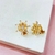 Brinco de pressão flor de zircônia - banhado a ouro 18k