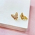 Brinco de pressão borboleta cravejada - banhado a ouro 18k