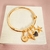 Bracelete com pingentes colchas - banhado a ouro 18k