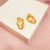Brinco abstrato cravejado - banhada a ouro 18k - comprar online