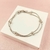 Pulseira fio duplo com bolinhas - aço inox G-R - comprar online