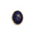 Entremeio oval de resina azul profundo com efeito pedra, veios dourados, superfície abaulada e brilhante e moldura de metal dourado.