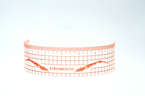 Medidor de cejas rosa