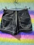 SHORT SIMIL CUERO CON BOLSILLOS 'HEYBLACK'