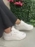 Tênis Ramarim off white com detalhe refletor na internet