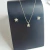 Conjunto de joias em prata 925 com pingente e brincos em formato de estrela com zircônia cristal