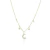 Colar feminino com pendentes de lua e estrelas, cravejado de zircônias, em corrente dourada.