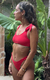 Top sport con lazo rojo
