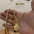 Imagem do Kit Corrente Palmeira 3mm Fecho Bomba e Pingente Coração N. Sra. Aparecida Cravejado P 3x2cm Banhado A Ouro 18k