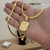 Imagem do Kit Corrente Grumet Flat 4mm Fecho Duplo e Pingente Plaquinha De Letra 3x2,2cm Banhado A Ouro 18k