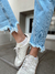 Jeans Mom Fit Deflecado en internet