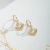 Brinco Argolinha Click de Coração e Zircônia Banhado a Ouro 18k