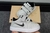 NIKE BABY GRIS CON ABROJOS