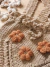 Enterito tejido con flores - comprar online