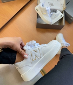 NB CT303 Branco/Ouro na internet
