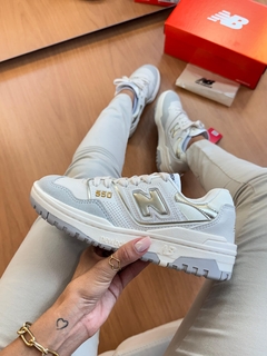 NB 550 Bege/Ouro na internet