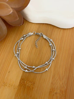 PULSEIRA TRIPLA BOLINHAS EM AÇO INOX - comprar online