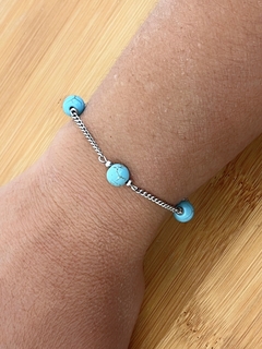 PULSEIRA BOLAS HOWLITA TURQUESA EM AÇO INOX