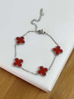 PULSEIRA TREVO VERMELHA EM AÇO INOX - comprar online