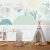 Papel de Parede Tranquilidade Tropical Folhagens Suaves e Tons Pastel
