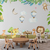 Papel de Parede Safari Infantil com Balões e Folhagens Tropicais - Fofo Decor