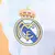 Camisa Real de Madrid Pré-jogo 25/26 - Torcedor Adidas Masculina - Branca com detalhes em laranja e preto e azul - JF SPORTS - Artigos Esportivos 