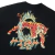 Camiseta preta com estampa de tigre em chamas e a palavra "HIGH" estilizada.