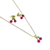 Collar y aretes en forma de cereza, con detalles dorados y cerezas rojas.