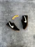 Dunk SB Low Negra y Caramelo
