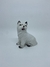 ESCULTURA DE PORCELANA EM FORMATO DE CÃO