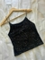 Top musculosa brillo negro