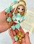 Receita Terço Santinha Amigurumi - PDF