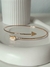 brazalete flecha cruzado dorado