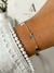 Pulsera con dijes chapitas colgantes