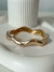 Esclava ondulada con bisagra acero dorado