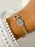 Pulsera rolo con chapita inicial en internet
