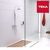 Grifería de baño Teka con barra de ducha en un ambiente moderno y minimalista.